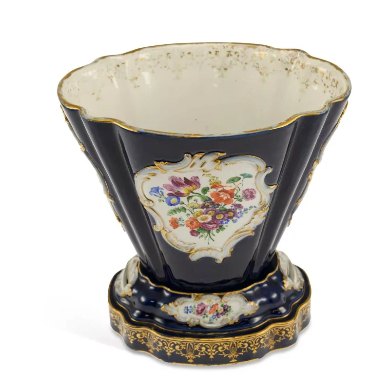 A Meissen Porcelain Cachepot And Stand Circa 1870 Sèvres style, painted with panels of figures in 18th Century costume and a spray of flowers