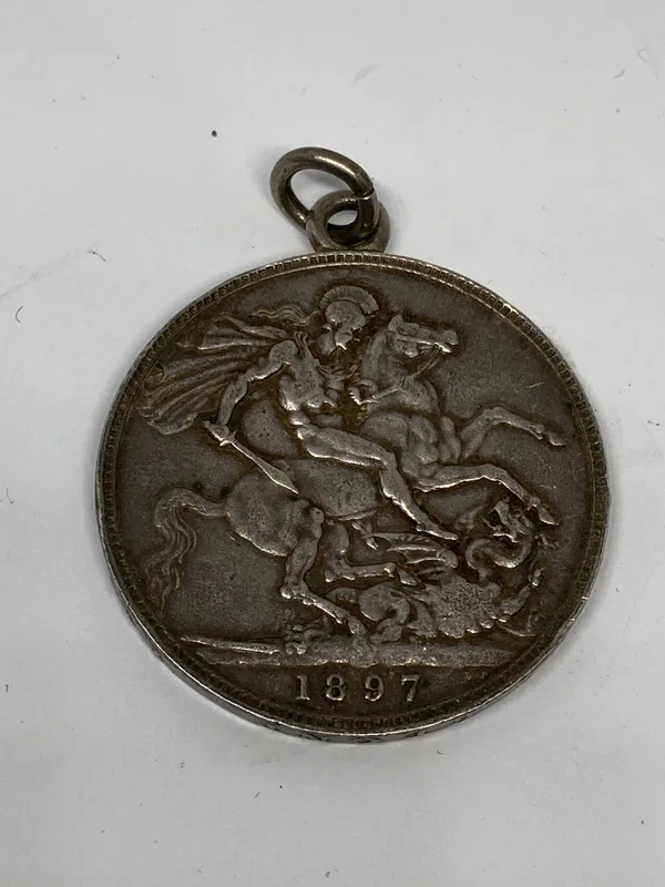 An 1897 Victorian Silver Crown Pendant