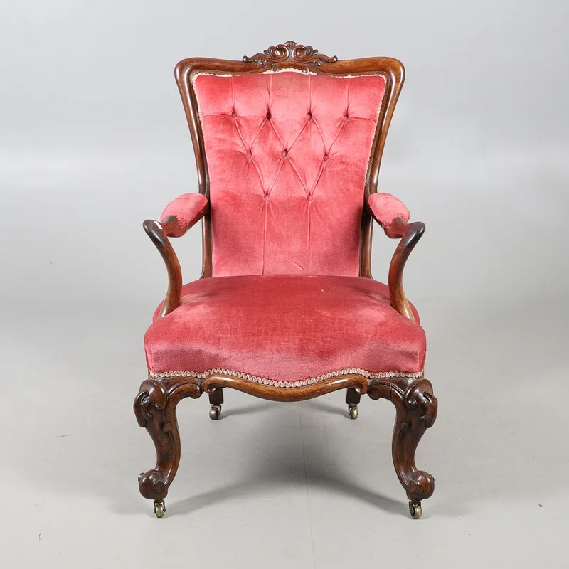A Victorian Carved Rosewood Open Armchair