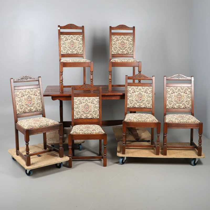 An Oak Reproduction Dining Table and Six Chairs
