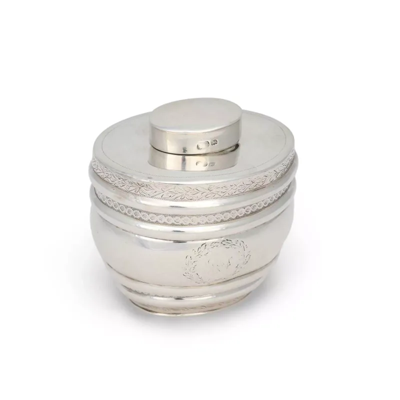 A George III Silver Tea Caddy by Thomas Robins, London 1803, of compressed oval form with girdles