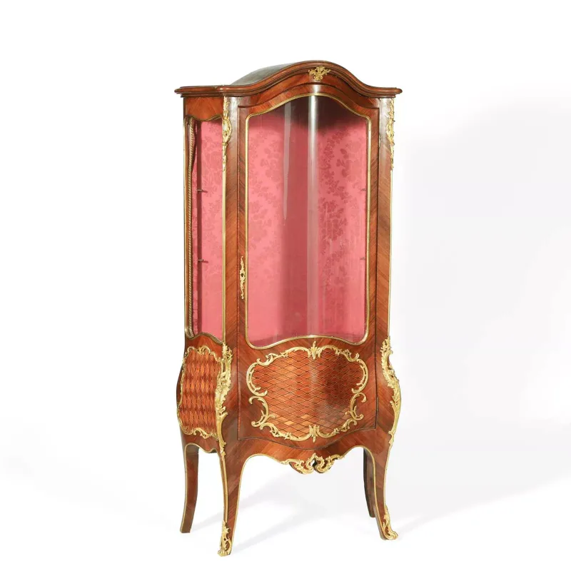 A Louis XV Style Kingwood And Parquetry Gilt Metal Mounted Bombé Vitrine 19th Century the arched pediment above a bowed glass door flanked by glass sides with b
