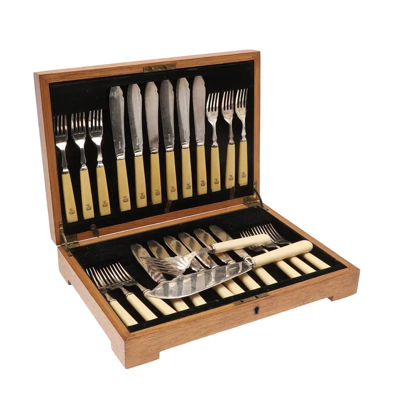 A Cased Matched Twelve Place Canteen of Cutlery