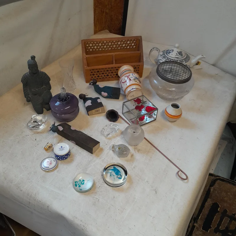 Mixed era ceramics and glassware : paperweights, Chinese Warrior ornament, coloured glass, Chinese scent bottle etc