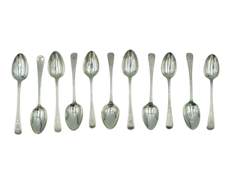 A selection of George III and later Old English-pattern bright-cut decorated silver teaspoons