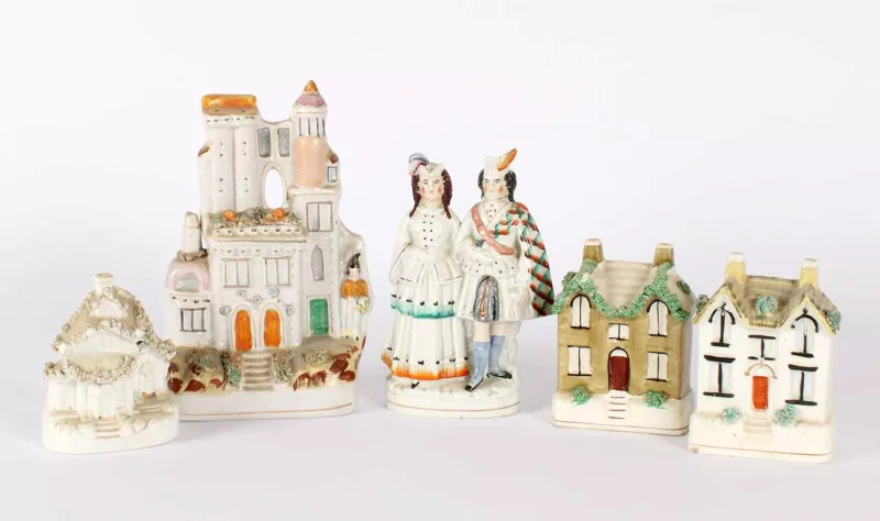 A 19th Century Staffordshire Pottery Group of Five A 19th Century Staffordshire Pottery Group of Five , comprising a castle-form pastille burner