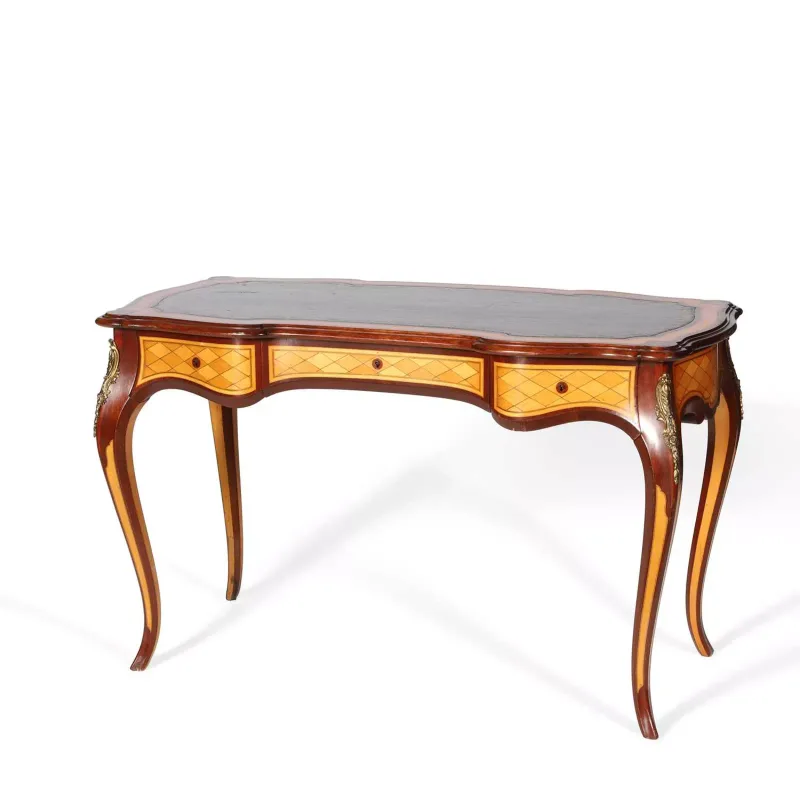 A Louis XV Style Parquetry Writing Table the serpentine top inset with a tooled leather writing surface within a crossbanded border