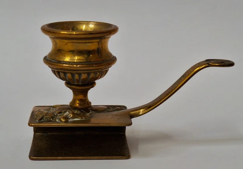Vintage Brass Chamber Stick with matchbox holder decorated with the image of horse & rider approx.