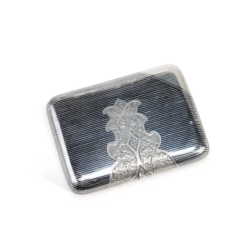 A 19th Century Russian Silver Cigarette Box maker's marks Ah, Moscow 1896, of rounded rectangular form with a hinged cover, linear decoration