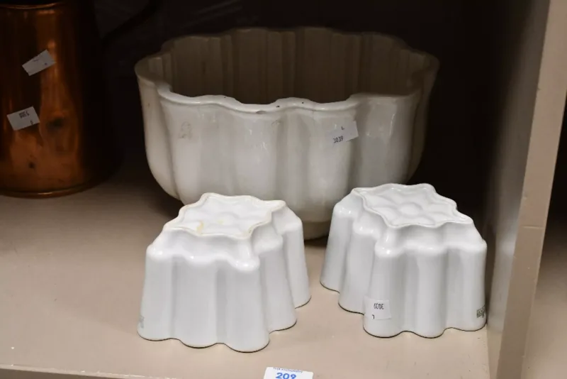 Three Victorian ceramic jelly moulds, of varying sizes, unmarked, (3),
