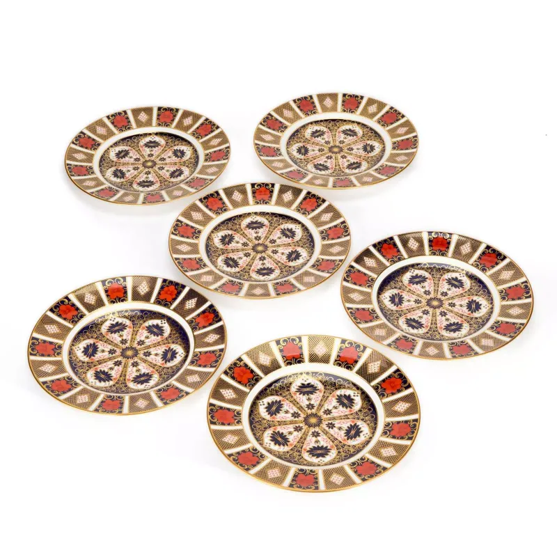 A Set Of Six Royal Crown Derby Dinner Plates Imari 1128 pattern, of first quality, printed factory marks, dated 2001