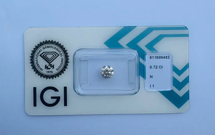 1 pcs Diamond (Natural) - 0.72 ct - Round - N (tinted) - I1 - International Gemological Institute (IGI)