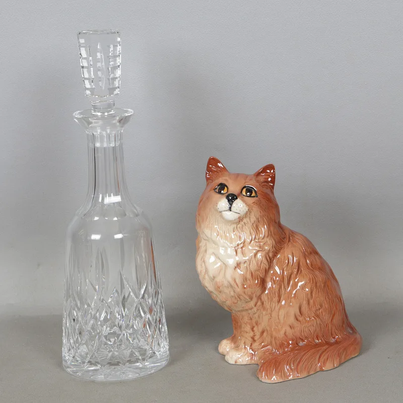 A Beswick Seated Persian Cat, a Waterford Crystal Decanter (2)