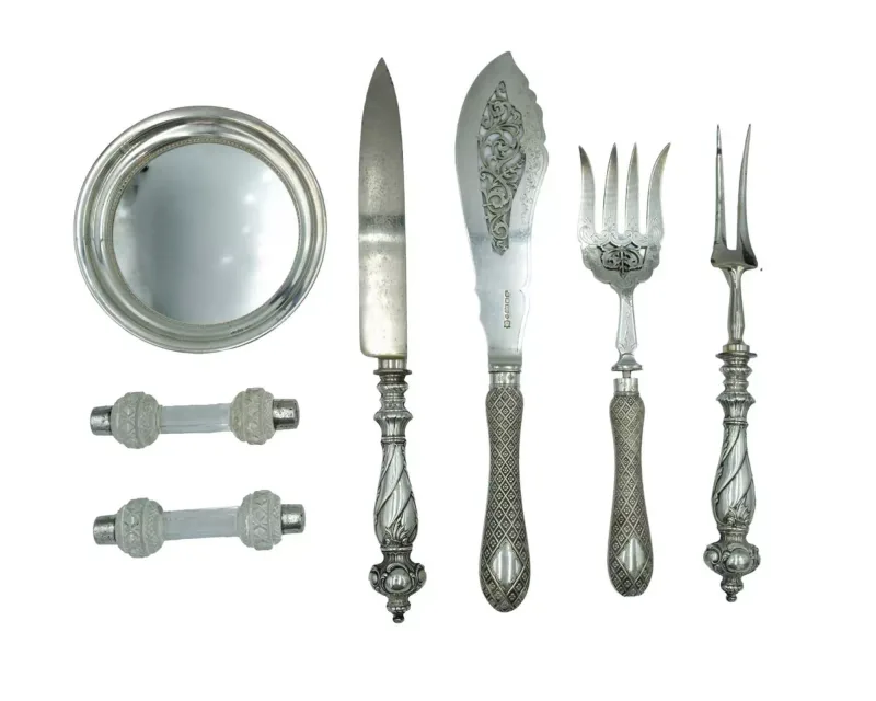A pair of silver-mounted crystal knives rests by William Henry Sparrow