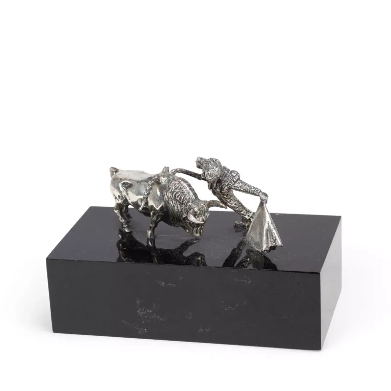 A Spanish Silver Group Of A Bull And Matador mid-20th Century, the matador modelled executing a pass with his cape as the bull charges