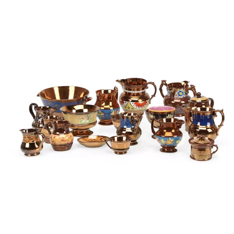 A Collection Of Copper Lustre Wares 19th Century, comprising jugs, goblets, bowls, a teapot, a saucer dish and a mug