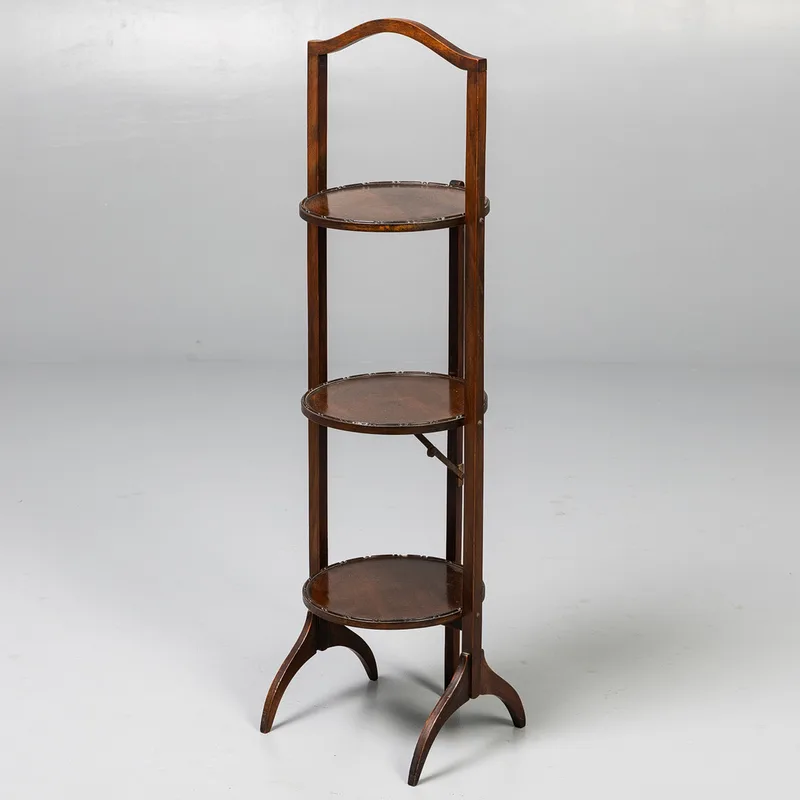 An Edwardian Oak Folding Cake Stand
