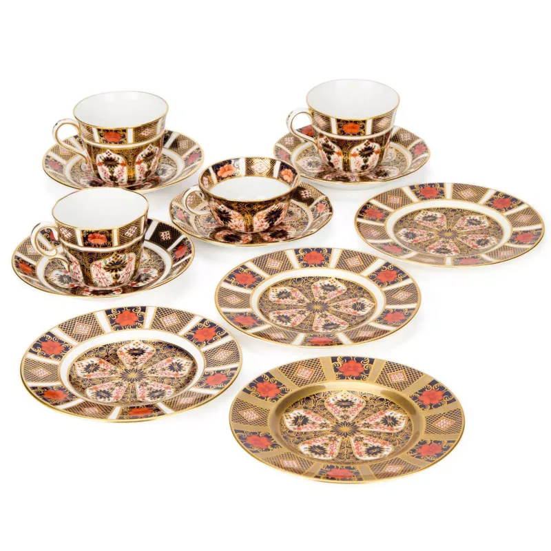 A Group Of Royal Crown Derby Imari Teawares 20th Century including four cups and saucers in the 1138 pattern and four Imari tea plates in the 1128 pattern